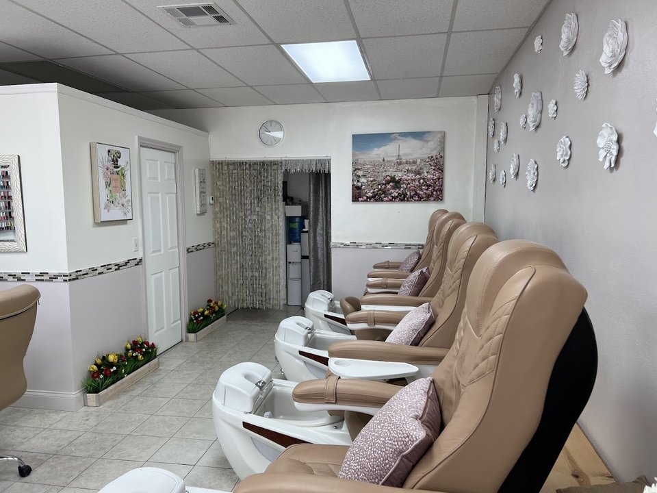 Polished nail service area with bright lighting.